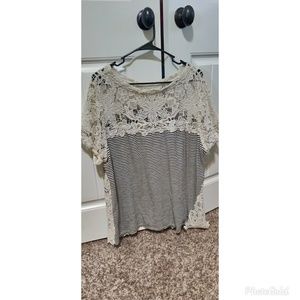 Black and White stripped shirt.